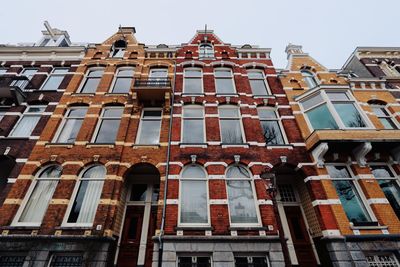 Exterior of building in city against clear sky