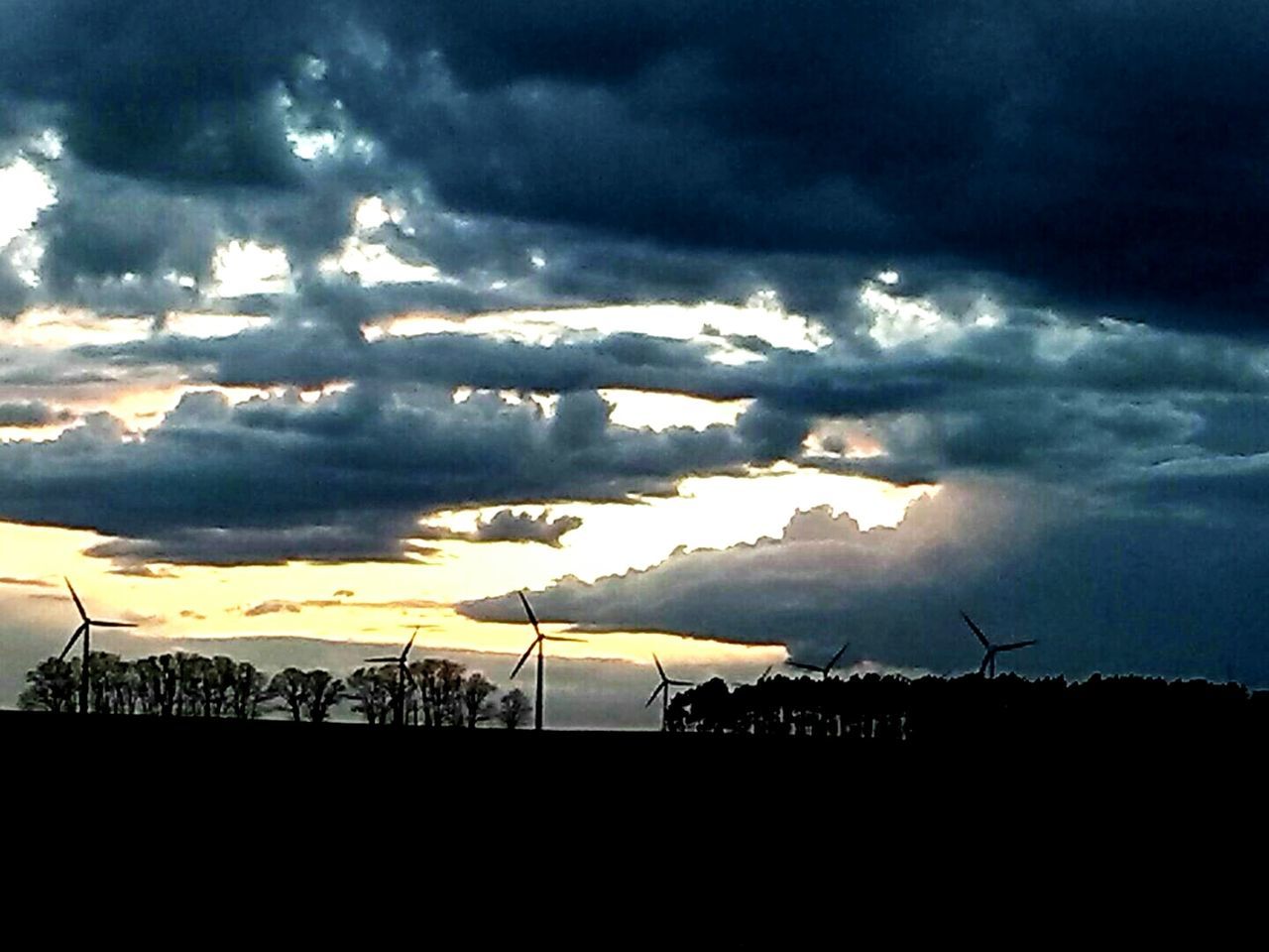 sky, cloud - sky, cloudy, silhouette, sunset, scenics, weather, landscape, beauty in nature, cloud, tranquil scene, tranquility, dramatic sky, nature, overcast, cloudscape, storm cloud, dusk, idyllic, atmospheric mood