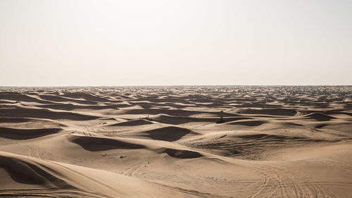 Scenic view of desert against clear sky