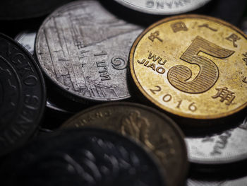 High angle view of coins on table