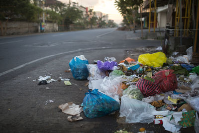 Close-up of garbage on the road