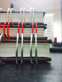 Close-up of stack of books on table