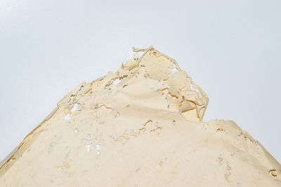 Close-up of chocolate cake against white background