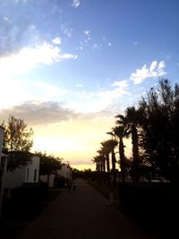 Scenic view of landscape against sky at sunset