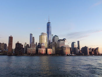 One world trade center by river in city