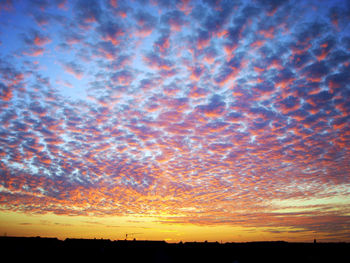 Scenic view of landscape at sunset
