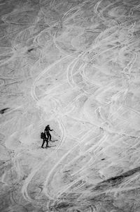 High angle view of people skiing on snow