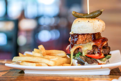 Close-up of burger in plate on table