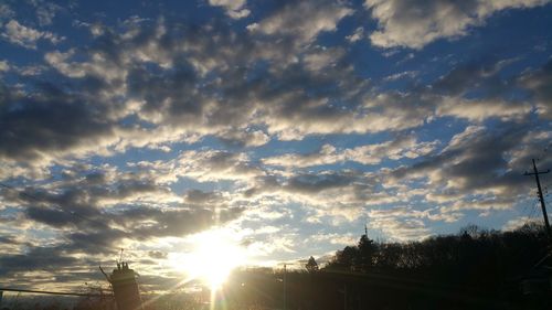 Low angle view of cloudy sky at sunset