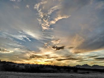 Scenic view of dramatic sky during sunset