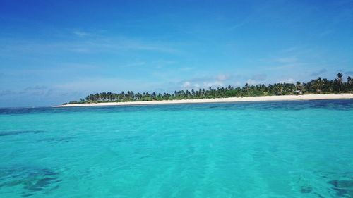 View of sea against blue sky