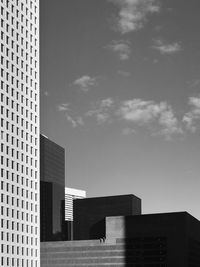 Low angle view of buildings against sky in city