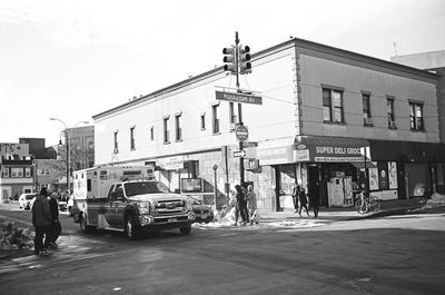 People walking on street in city