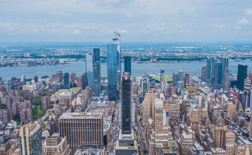 High angle view of buildings in city against sky