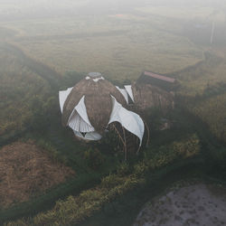 High angle view of field against mountain