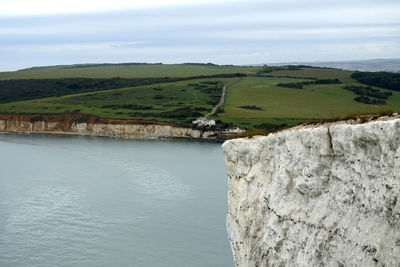 High angle view of sea and cliff