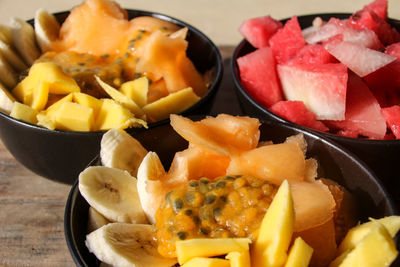 High angle view of fruits in plate on table