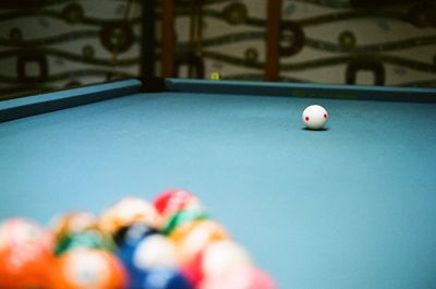 Multi colored snooker balls on table