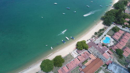 High angle view of city by sea