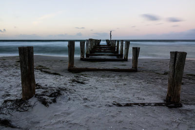 Scenic view of sea against sky at sunset