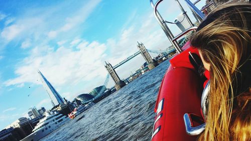 Low angle view of man on boat against sky