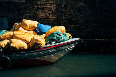 Luggage in boat on river