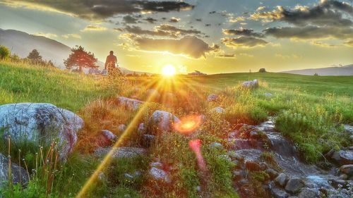 Scenic view of sunset over landscape