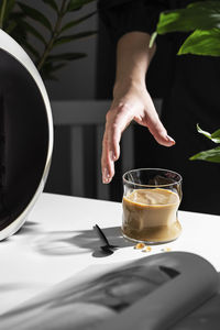 Woman drinking coffee with milk