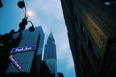 Low angle view of modern buildings against sky