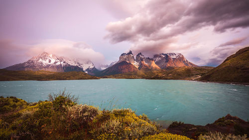 Scenic view of snowcapped mountains against sky