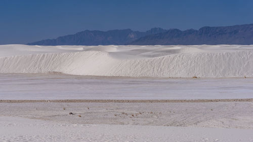 Scenic view of desert against sky