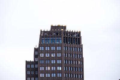 Low angle view of modern building against clear sky