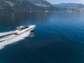 High angle view of boat sailing in sea