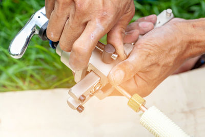 Close-up of man holding ice cream