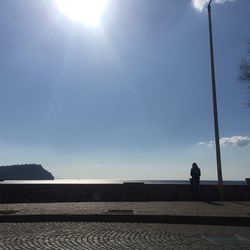 Man walking on sunny day