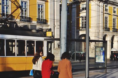 Woman standing in city