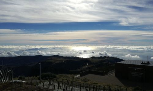 Scenic view of storm clouds over mountains