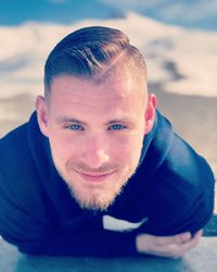 Portrait of young man outdoors