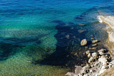 High angle view of rocks on beach