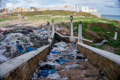 High angle view of garbage amidst buildings in city