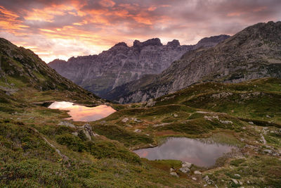 Scenic view of mountains against sky during sunset