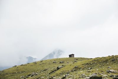 Scenic view of mountains during foggy weather