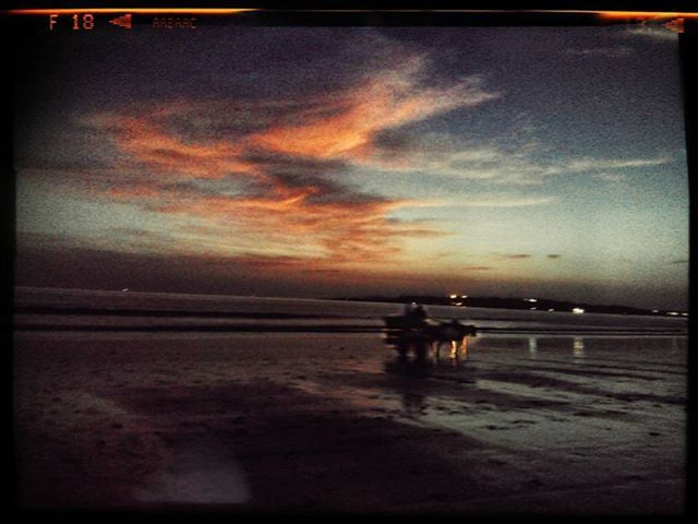 transfer print, sky, sea, beach, auto post production filter, sunset, water, horizon over water, shore, silhouette, cloud - sky, lifestyles, scenics, men, leisure activity, tranquil scene, sand, tranquility, beauty in nature