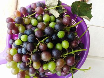 High angle view of grapes on table