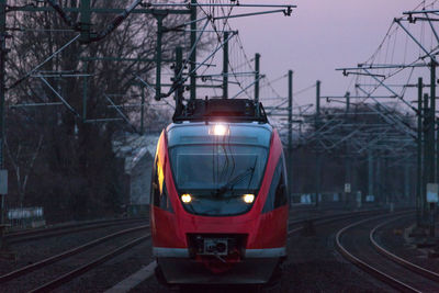 Train at railroad station in city