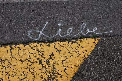 High angle view of text on road