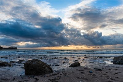 Scenic view of sea against sky during sunset