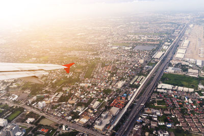 Aerial view of cityscape against sky