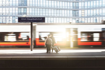 Blurred motion of train at railroad station