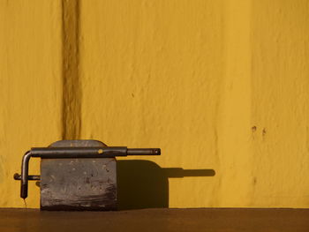 Shadow on yellow wall